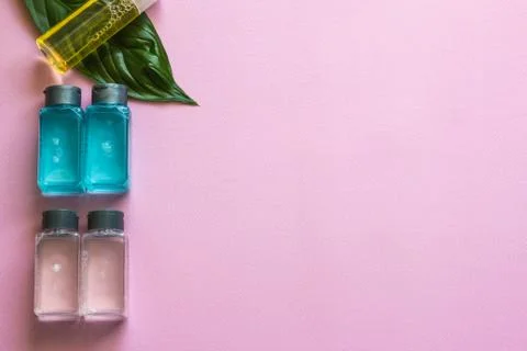Spa cosmetics set. Copyspace for text. Top view. Flatlay on pink background. Stock Photos