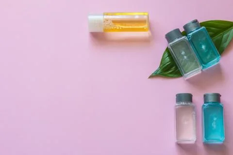 Spa cosmetics set. Copyspace for text. Top view. Flatlay on pink background. Stock Photos