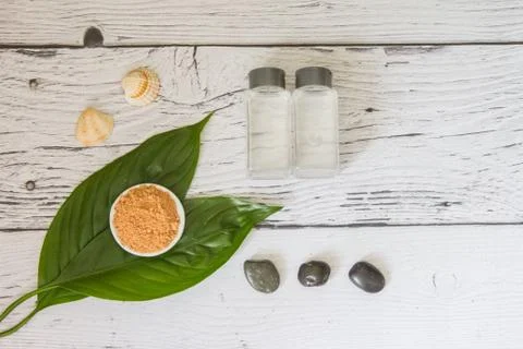 Spa cosmetics set. Copyspace for text. Top view. Flatlay on wooden background. Stock Photos