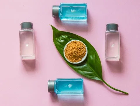 Spa cosmetics set. Copyspace for text. Top view. Flatlay on pink background. Stock Photos