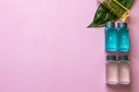 Spa cosmetics set. Copyspace for text. Top view. Flatlay on pink background. Stock Photos