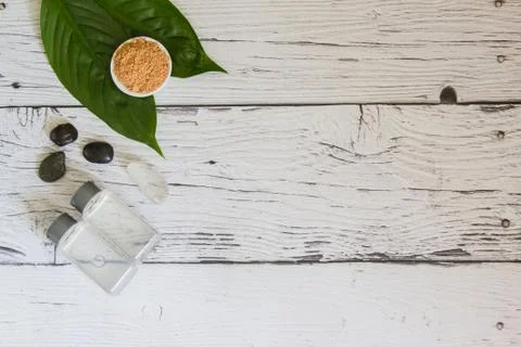 Spa cosmetics set. Copyspace for text. Top view. Flatlay on wooden background. Stock Photos