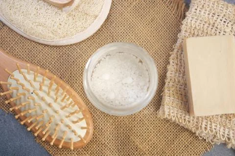 Spa elements including natural products and a wooden comb Stock Photos