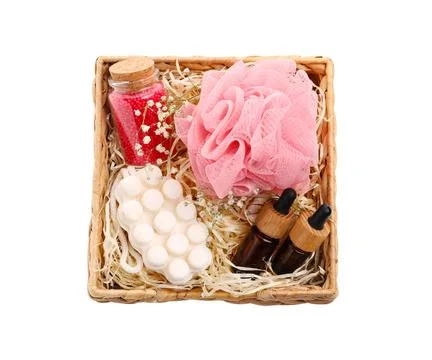 Spa gift set of different luxury products in wicker basket on white backgro.. Stock Photos
