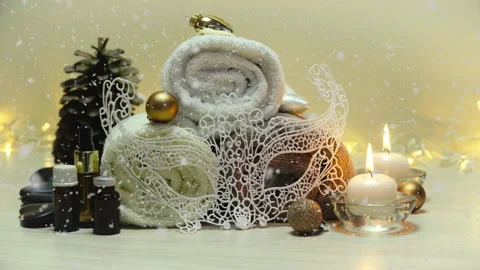 Spa salon items and attributes with christmas decorations in mild snowfall Stock-Footage 143893294