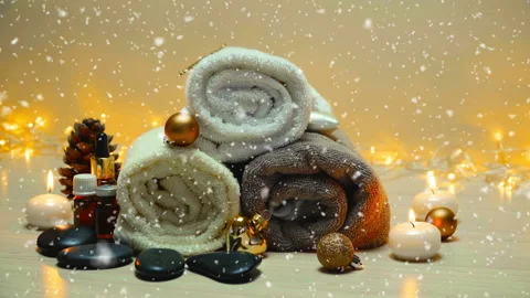 Spa salon items and attributes with christmas decorations in mild snowfall Stock-Footage 144219695