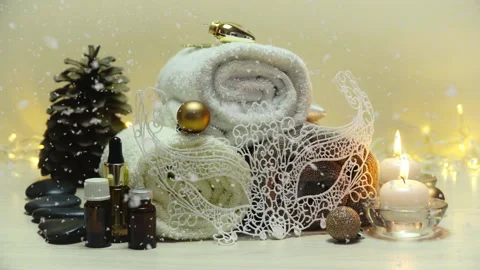 Spa salon items and attributes with christmas decorations in mild snowfall Stock-Footage 144637951