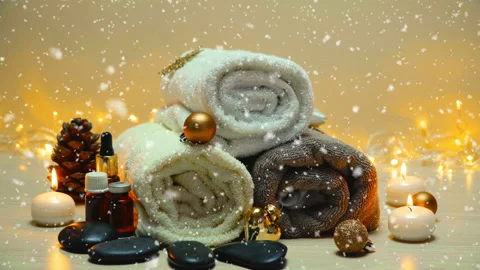 Spa salon items and attributes with christmas decorations in mild snowfall Stock-Footage 144944602