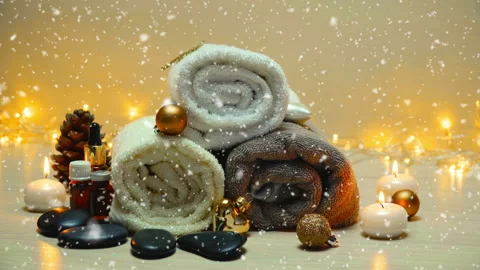 Spa salon items and attributes with christmas decorations in mild snowfall Stock-Footage 145427127