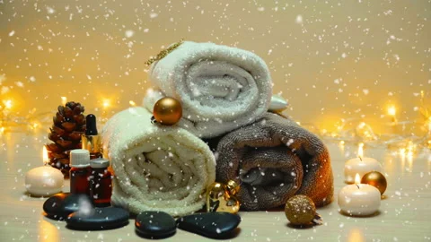 Spa salon items and attributes with christmas decorations in mild snowfall Stock-Footage 145518570