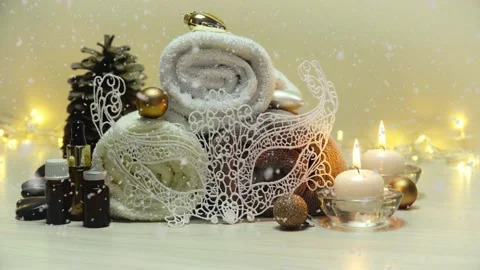 Spa salon items and attributes with christmas decorations in mild snowfall Stock-Footage 145814214