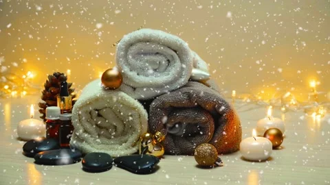 Spa salon items and attributes with christmas decorations in mild snowfall Stock-Footage 146424055