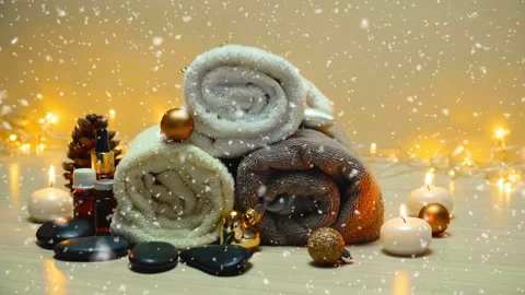 Spa salon items and attributes with christmas decorations in mild snowfall Stock-Footage 146998293