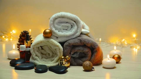 Spa salon items and attributes with christmas decorations in mild snowfall Stock-Footage 147623556