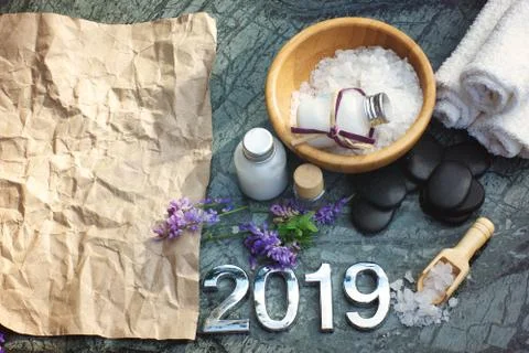 Spa set for 2019 with bath salt and white lotion, towels prepared for the pro Stock Photos