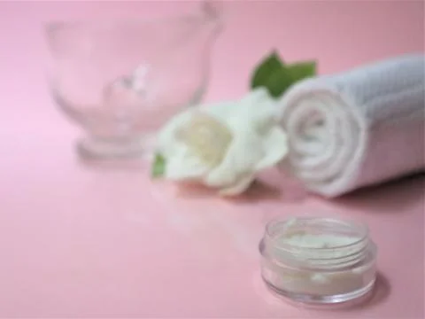 Spa setting and Spa background composition with white gardenia flower on pink Stock Photos