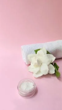 Spa setting and Spa background composition with white gardenia flower on pink Stock Photos