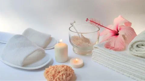 Spa setting and Spa background composition with hibiscus pink flower on white Stock Photos