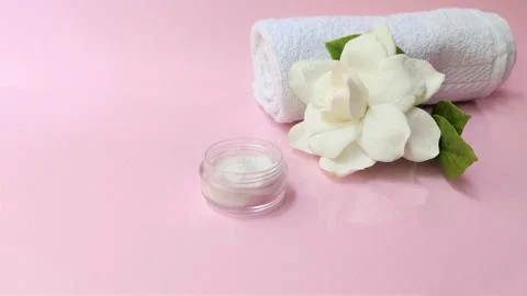 Spa setting and Spa background composition with white gardenia flower on pink Stock Photos