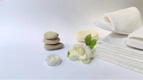 Spa setting and Spa background composition with white gardenia flower on whit Stock Photos