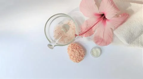 Spa setting and Spa background composition with hibiscus pink flower on white Stock Photos