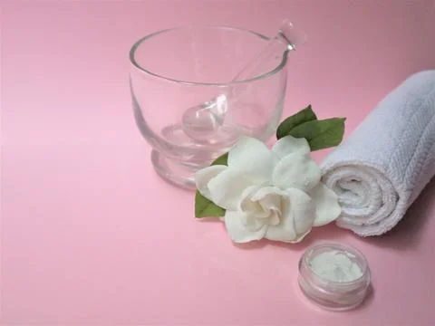Spa setting and Spa background composition with white gardenia flower on pink Stock Photos