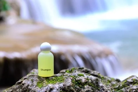 Spa shampoo on waterfall background. Stock Photos