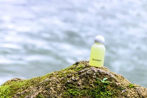 Spa shampoo on waterfall background. Stock Photos
