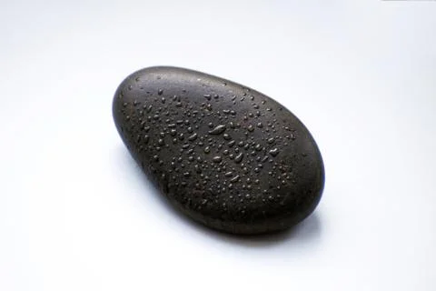 Spa stone with drops on white background Stock Photos