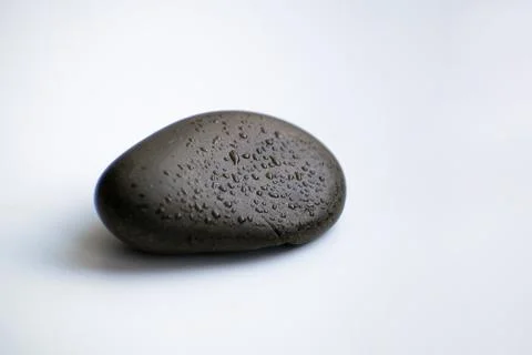 Spa stone with drops on white background Stock Photos