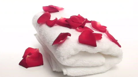 Spa towel with rose petals loop - HD Stock Footage 572235