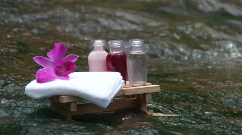 Spa treatment on waterfall background. 스톡 동영상 66380964