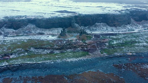 Space alien landscape: sea, rocks, ice, snow, desert area. Murmansk, Russia. Stock Footage 145631366