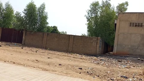 Space Between Building Walls Warehouse And Fenced Plot Kano Nigeria 動画素材 328223109