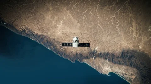 Space Capsule orbiting above earth 4k Stock Footage 82545471