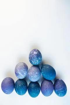 Space colored eggs on white background. Stock Photos