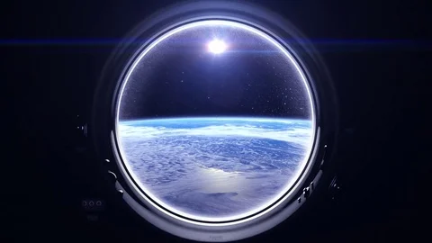 Space. Earth through the porthole window. The sun in the window of the 스톡 동영상 75240462