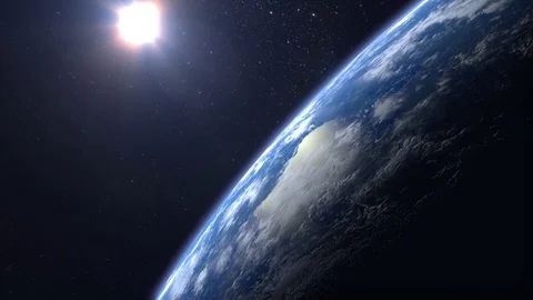 Space. Flight over the Earth. 4K. Sunrise. The camera rotates to the right. Stock Footage 82239722