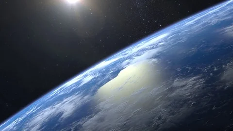 Space. Flight over the Earth. 4K. Sunrise. The horizon rotated to the left. Stock Footage