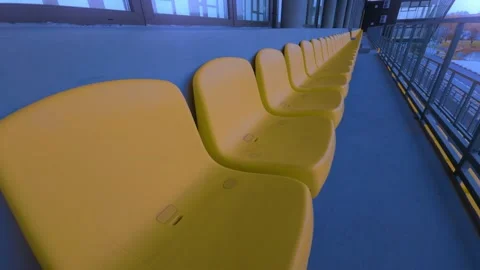 The space has a vibrant yellow seating arrangement that enhances its modern Stock Footage 306968546