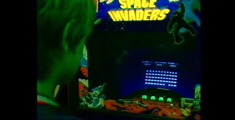 Space Invaders arcade craze with gamers in Australia 1982 Stock Footage 318348872