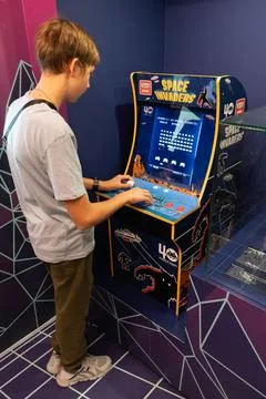 Space invaders Taito game machine. Simple Space Arcade in 8-bit retro video old Stock Photos