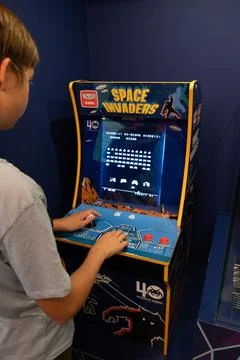 Space invaders Taito game machine. Simple Space Arcade in 8-bit retro video o Stock Photos