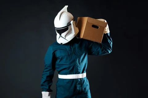 A space loader, a courier of the future delivered your parcel. Stock Photos