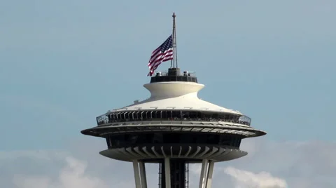 Space Needle Close-up in Seattle with Flag Blowing Stock Footage 931871