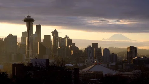 Space Needle Seattle Skyline Mt. Rainier on a cloudy morning - sunrise Stock Footage 124801857