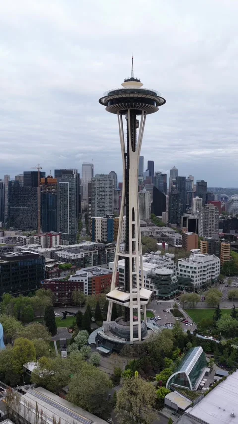 Space Needle towers above downtown Seattle skyline, iconic observation deck Stock Footage 340176348