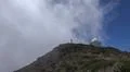 Space observatory telescope on mountain peak with heavenly clouds in La Palma Photo