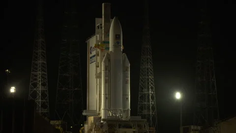 Space rocket Ariane 5 on the launch pad by night Stock Footage