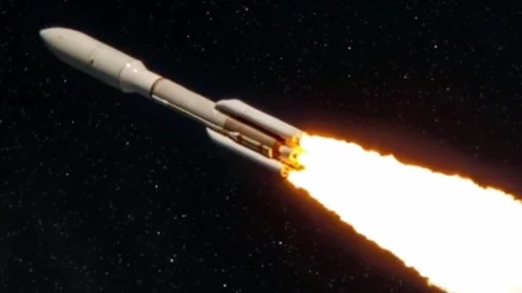 Space rocket flying through deep space with bright orange fire against a starry Video stock 332597250